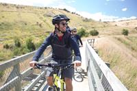 Crossing Hyde Bridge on the Otago Rail Trail. Image credit: Tom Powell